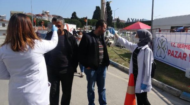 Germencik'te dezenfeksiyon tünelinden geçmeden pazara girilmiyor